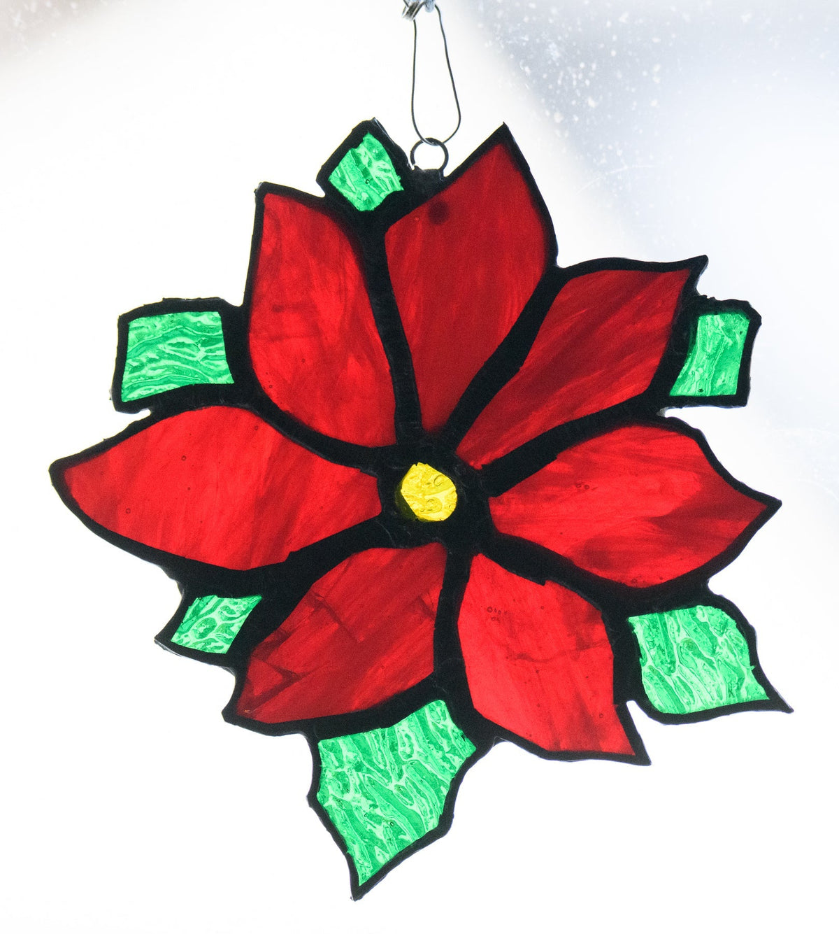 Handmade stained glass Poinsettia by Through The Pane Studios