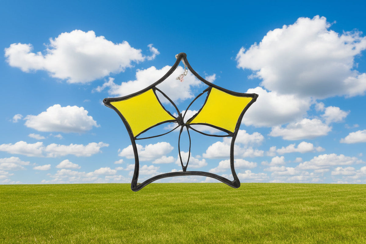 Handmade stained glass Pentagram with yellow and clear points by Through The Pane Studios