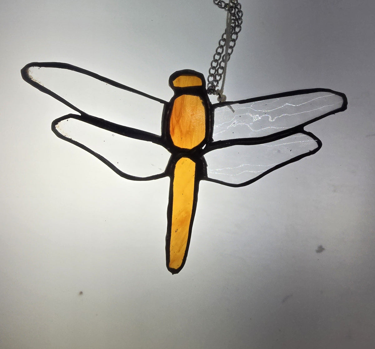 Handmade stained glass by Through The Pane Studios