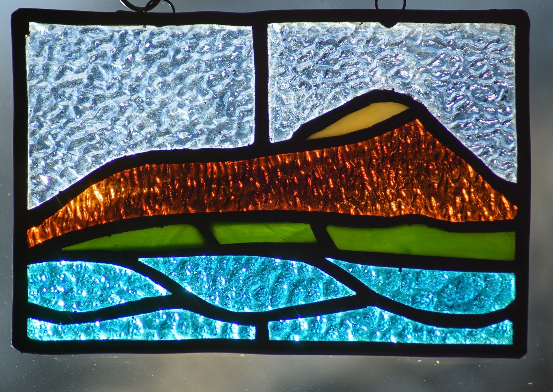 Handmade stained glass Diamond Head by Through The Pane Studios