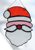 Handmade stained glass Santa by Through The Pane Studios