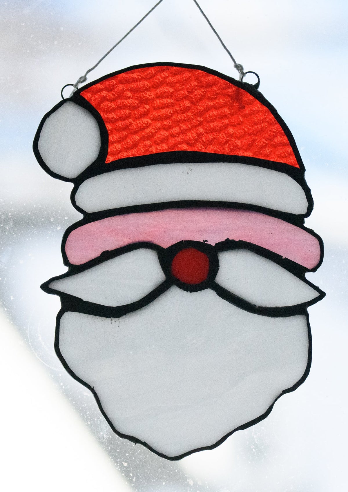 Handmade stained glass Santa by Through The Pane Studios